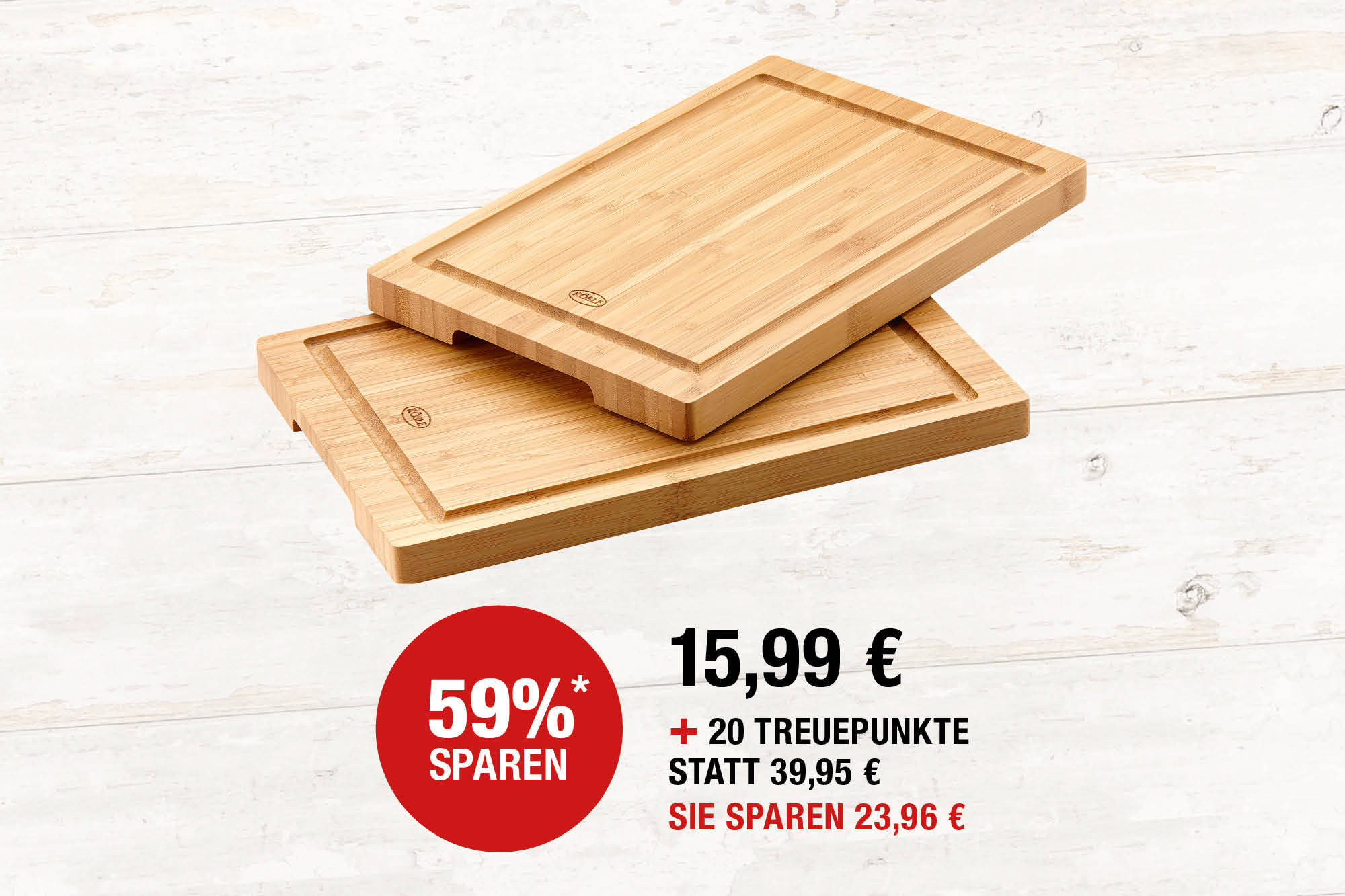 Schneid- und Servierbrett, 2er Set. Bambus, L 30 x B 20 x H 2 cm. Mit Saftrille und Griffmulde. Rutschfeste Gummifüße. Handreinigung empfohlen.