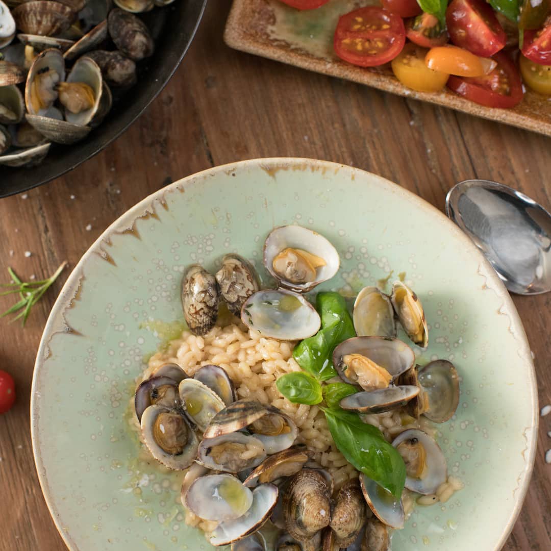 Venusmuscheln mit Risotto